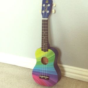 A ukulele with bag and pick